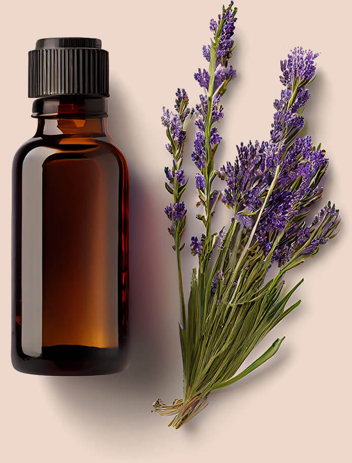 A brown glass bottle set next to some lavender