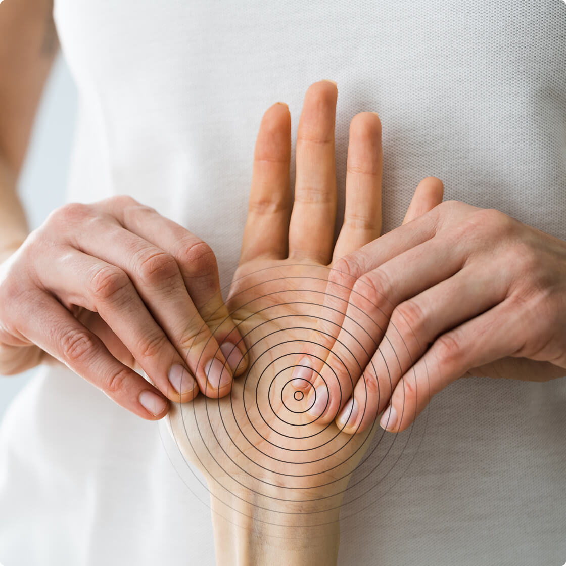 A patient receiving a hand massage